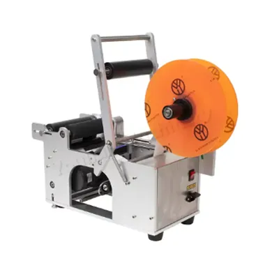 Universal Seal Automatic MT50 Round bottle Labeling Machine used in the Food, Beverage, Cosmetic, Pharmaceutical Industries